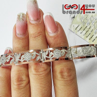 Серебряный браслет с золотыми вставками 086